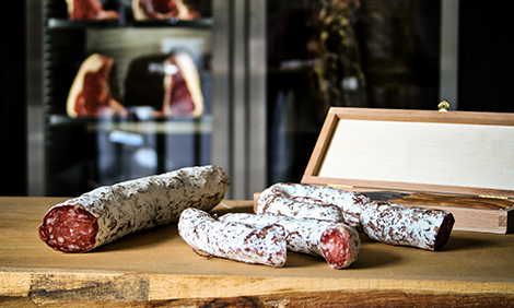 Dry aging of sausage and ham