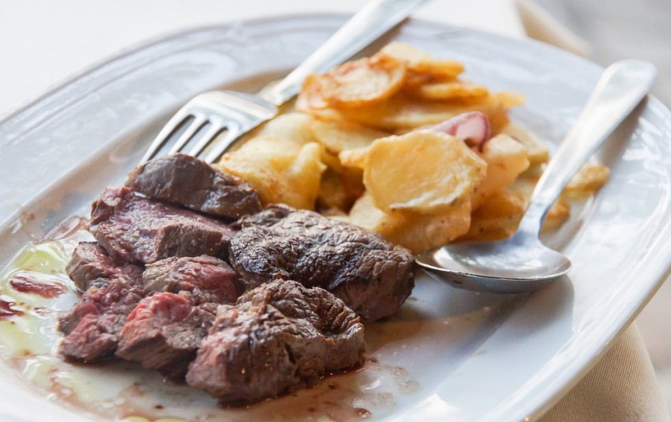 Dry-Aged Steak with grilled potato slices Dry-Aged Steak with grilled potato slices