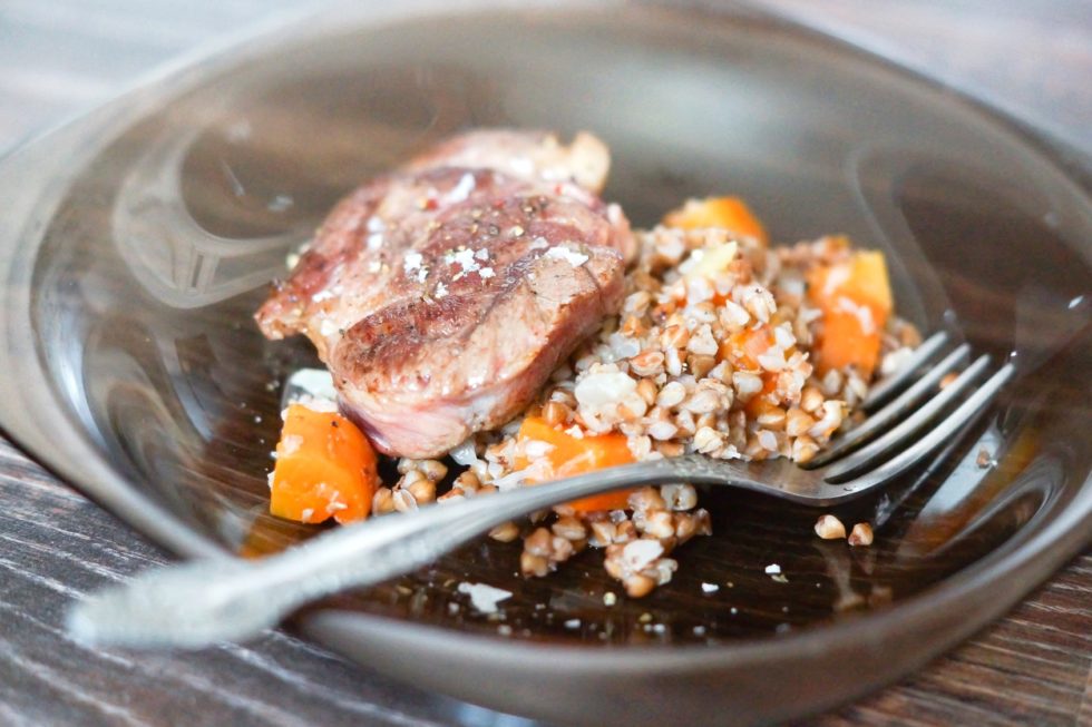 Dry-Aged beef steak with buckwheat, onions and carrots Dry-Aged beef steak with buckwheat, onions and carrots